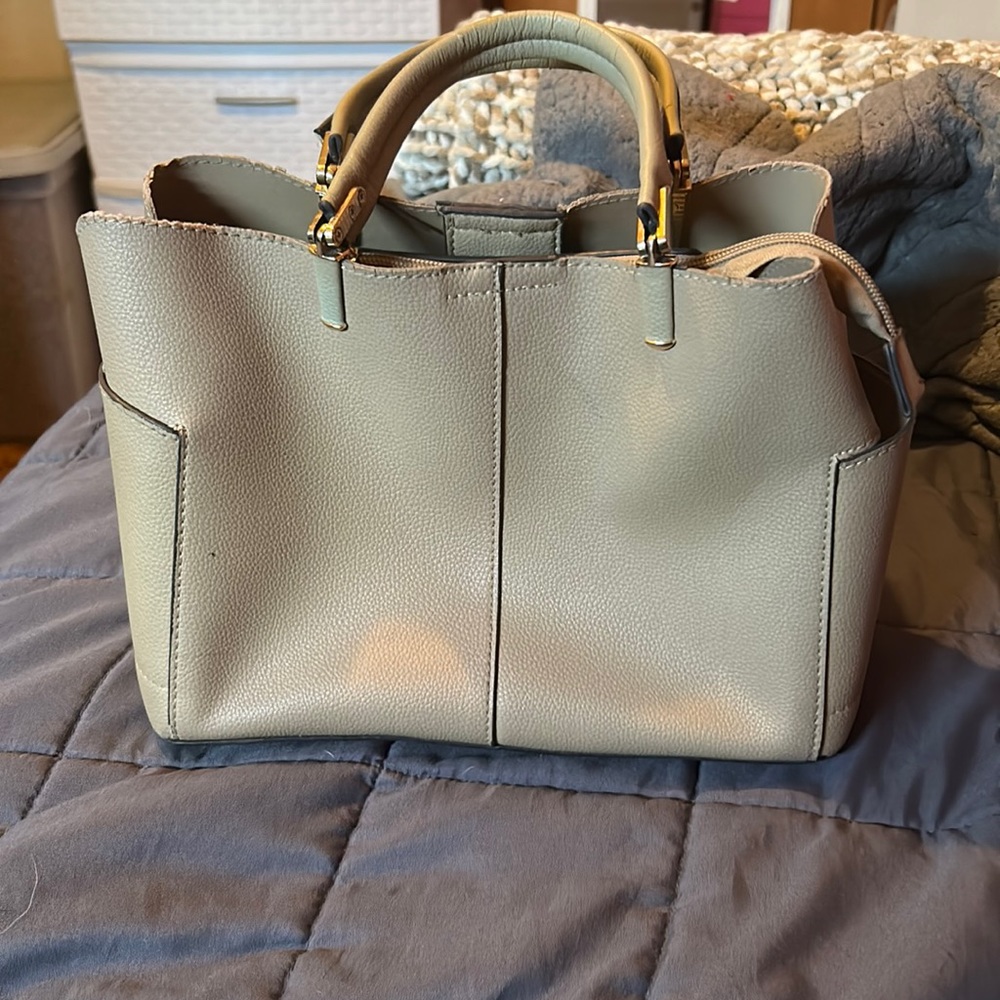 Small tan handbag. Gently used and in good condition